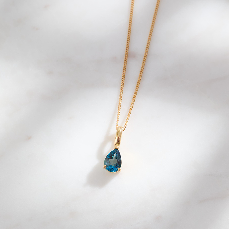 Cadena Pancer de 1mm + Dije de Oro con Topacio London Blue Natural corte Pera